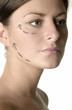 Woman's face with arrows showing up.