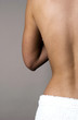 Foto: Back shot of a topless woman. Back shot of a topless woman.