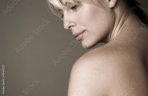 Photo: Woman staring blankly at a space. Woman staring blankly at a space.