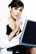 Businesswoman showing a hushing sign.