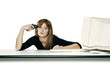 Businesswoman pointing pistol at herself.