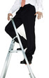 Businessman standing on top of a ladder.