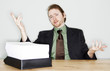 Businessman with a pile of paper works.