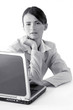 Businesswoman using laptop.