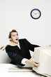 Businessman being blown away by the desktop computer.