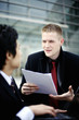 Businessmen having discussion.