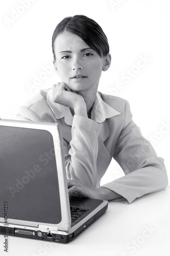 Photo: Businesswoman using laptop. Businesswoman using laptop.