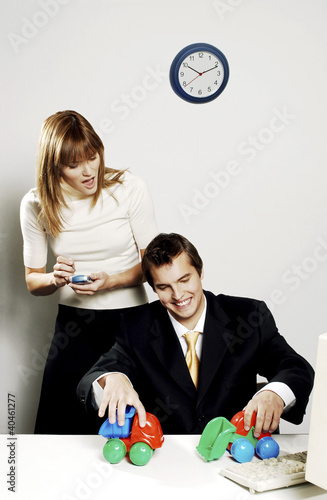 Photo: Businessman demonstrating for his superior. Businessman demonstrating for his superior.