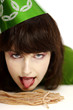Woman licking candy.