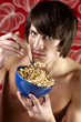 Man having cereal breakfast.