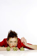 Photo: Woman having some green noodles. Woman having some green noodles.