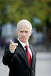 Businessman pointing his finger.