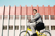 Photo: Businessman cycling to work. Businessman cycling to work.