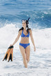 Woman coming back from snorkeling.