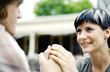 Loving couple holding hands.