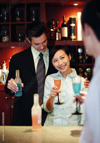 Photo: Business people proposing a toast. Business people proposing a toast.