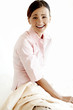 Foto: Businesswoman smiling at the camera. Businesswoman smiling at the camera.
