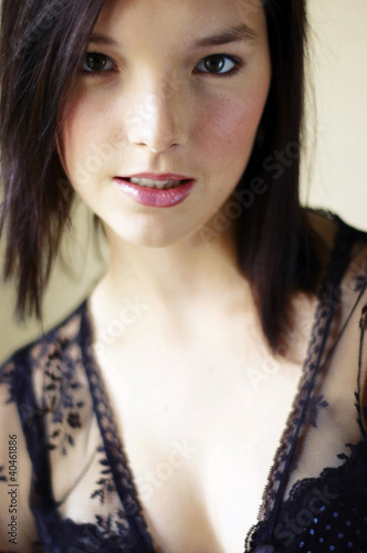 Photo: Woman flashing a smile at the camera. Woman flashing a smile at the camera.