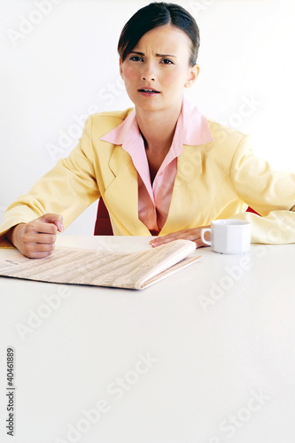 Photo: Businesswoman showing a dissatisfied look. Businesswoman showing a dissatisfied look.