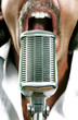 Man screaming into a microphone.