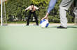 Photo: Businessmen playing football. Businessmen playing football.