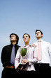 Corporate people with their trophy.