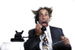 Businessman receiving a shocking phone call.