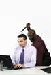 Businessman trying to stab his colleague with a knife.