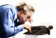 Businessman using a typewriter.