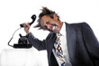 Businessman knocking his head with a phone receiver.