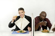 Businessmen enjoying their meal.