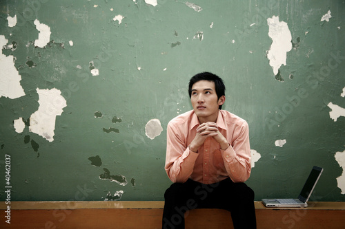 Photo: Businessman daydreaming. Businessman daydreaming.