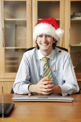 Photo: Businessman in christmas mood. Businessman in christmas mood.