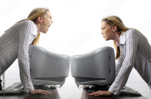 Photo: Two businesswomen in bad mood. Two businesswomen in bad mood.