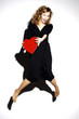 Businesswoman holding a red heart.
