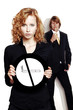 Businesswoman holding a no smoking sign.