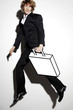 Businessman carrying a briefcase.