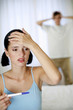 Couple looking depressed after getting the pregnancy test result.
