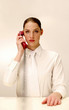 Businesswoman answering a phone call.