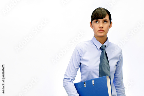 Foto: Businesswoman holding a document. Businesswoman holding a document.