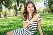 Young woman in summer park