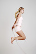 Woman skipping.