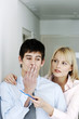 Photo: Businesswoman offering her colleague a toothbrush. Businesswoman offering her colleague a toothbrush.