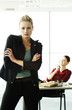 Photo: Businesswoman getting frustrated with her colleague. Businesswoman getting frustrated with her colleague.