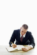 Businessman writing.