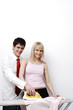 Photo: Couple ironing clothes. Couple ironing clothes.