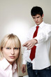 Photo: Businessman pointing at his colleague. Businessman pointing at his colleague.