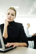 Businesswoman using laptop.