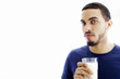 Man holding a glass of milk.