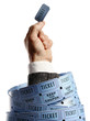Hand holding a ticket.